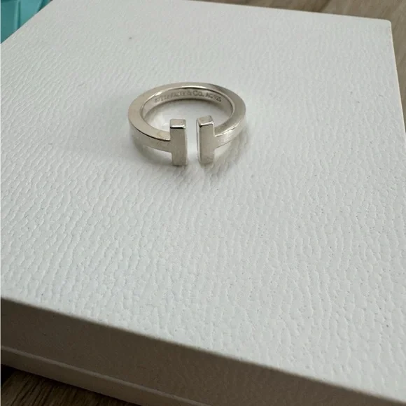 Tiffany & Co. Silver T Design Ring Sz 7
Via - Picture 5 of 10